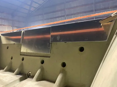 Fabricated transom sleeve shown beside its metal model